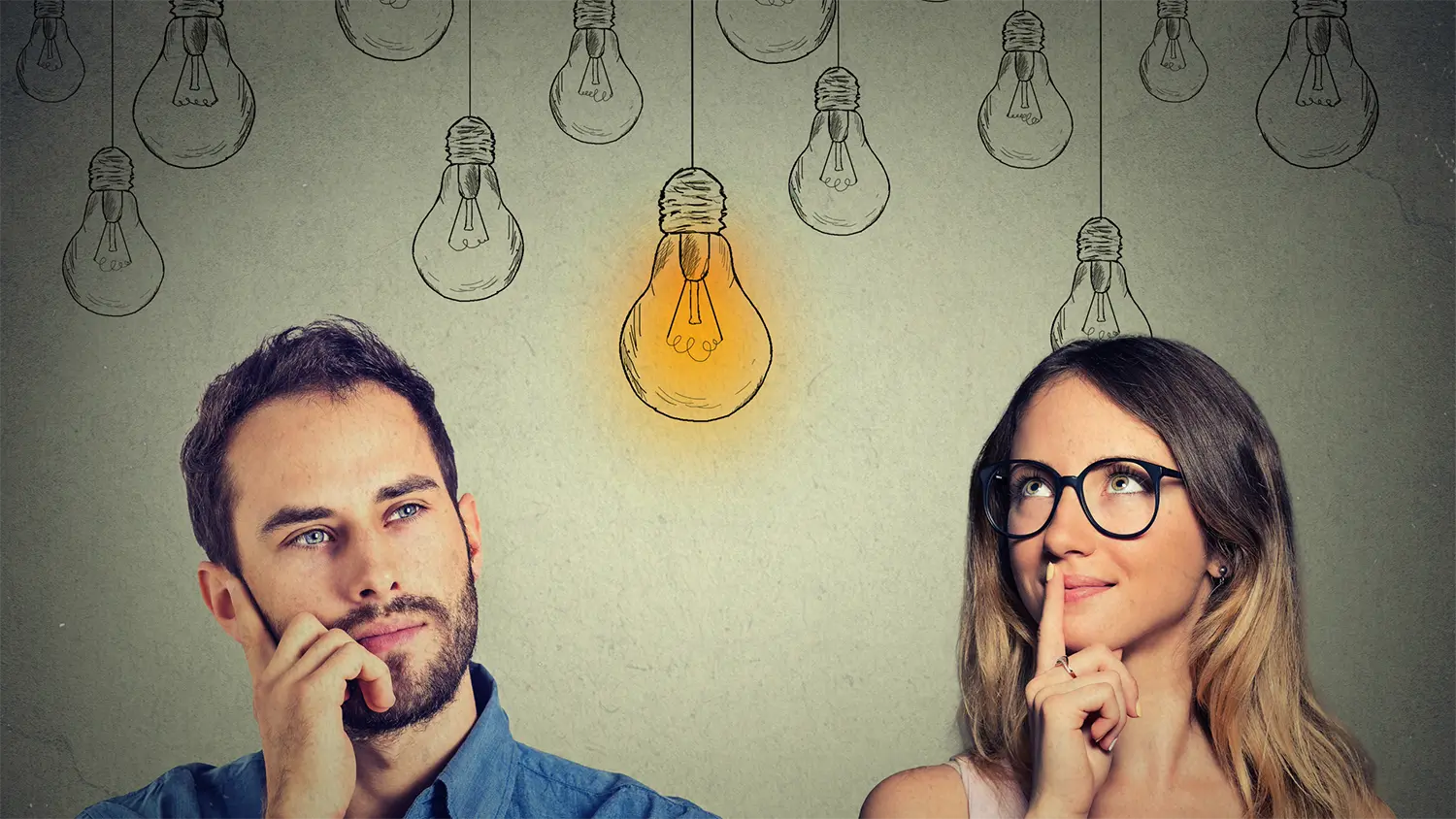 Image of a man and woman considering the difference between operations and strategy consulting with sketched lightbulbs drawn behind them.